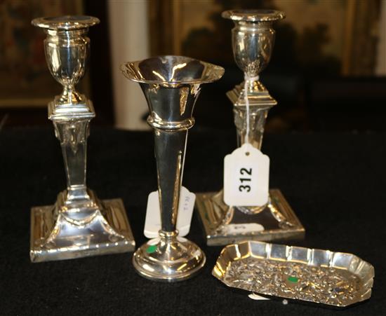 Pair Edwardian silver pillar candlesticks with rams mask, urn & swag decoration, a pin tray & a specimen vase